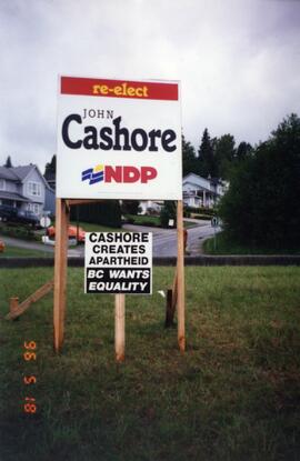 Re-elect John Cashore sign with opposition sign