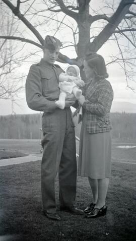 Gordon Headridge and Catherine (Dowding) Headridge holding a baby