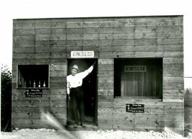 Thomas Wesley in front of an ice cream store on Pitt River Rd.