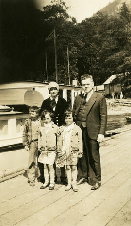 Agnes Byrne, Ultan Patrick Byrne, Peter Ultan Byrne, girl, and Beverlea Patricia May Byrne on a dock