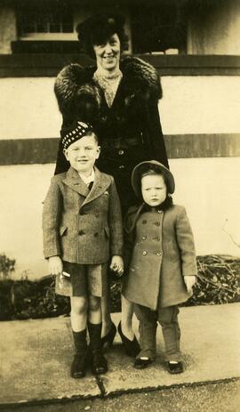 Ida May Headridge standing with Brian Bovet and girl