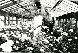 Annie and Wallace Whiting in their greenhouse