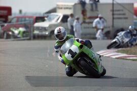 Steve Previs riding his motorcycle in a race in Calgary