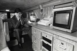 Phil Haig, realtor, in customised business van.