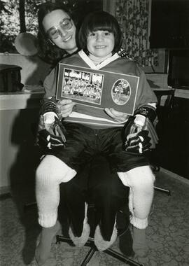 Hockey player with his mother