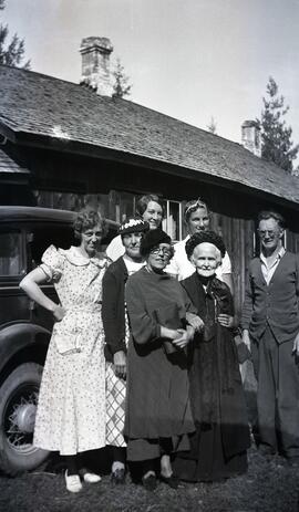 Ida May Headridge and William Headridge with group of older people