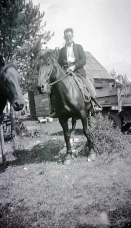 William Headridge riding a horse