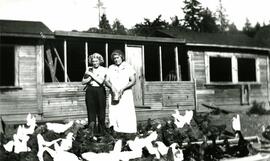 Bessie and Nellie Hobbis on the family farm at Como Lake Ave and Clarke Road