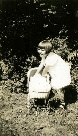 Inez Birtch with a pram