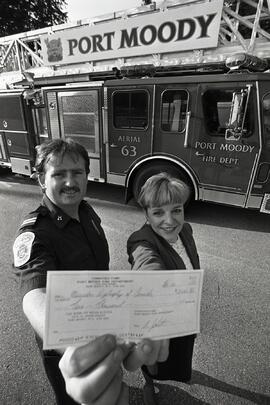 Muscular Dystrophy advocate and Port Moody Fire Department donation