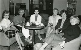 Group of women sitting in lounge with drinks