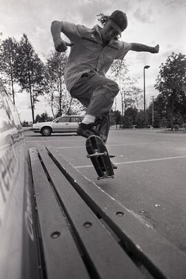 Skateboarder Matthew Higgins in parking lot near Coquitlam Rec Centre