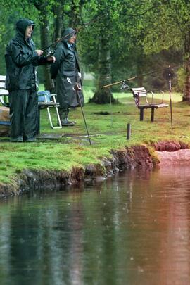 Walter Walker fishing at Como Lake in the rain