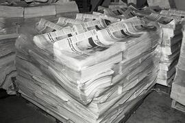Stacks of papers in bindery department