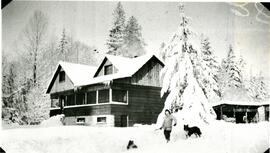 Clara Jacobs shoveling snow at Steelhead Lodge (Oxbow Ranch)