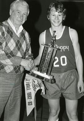 Basketball player withtrophy