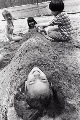 Anna Fuoco, Boky Dosenovic, Kristy Chan at Barnet Marine Park burying in sand