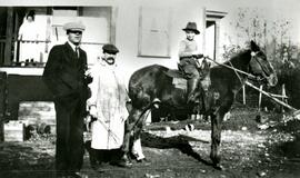Mr. Pett and Jim Rustle with Albert Pett on a horse