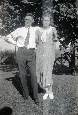 William Headridge and Billie Headridge standing in a yard