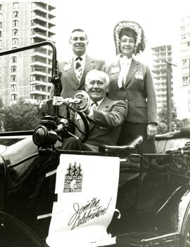 Centennial Parade Car with Committee Members Les Keen, Nancy Konsmo, and Bernie Moffat