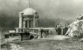 Workers and their wives pose beside the Coquitlam Dam
