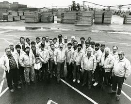 Group of workers wearing safety award jackets