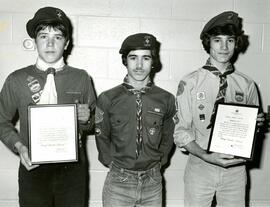 Three scouts display their awards