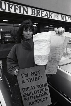 Michelle Reade protesting her termination from Muffin Break