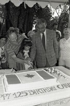 Cutting the Canada Day cake at Lions Park