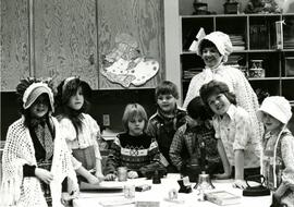Mrs. Bailey and students in period dress