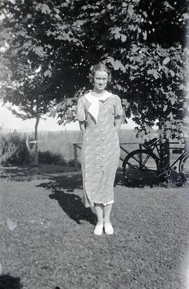Billie Headridge standing in a yard