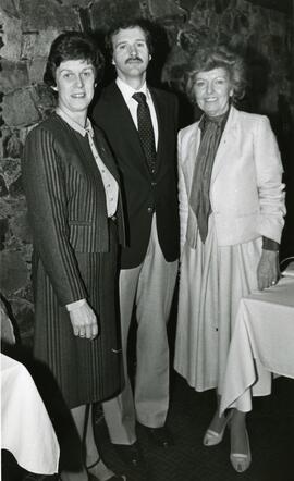 Three people posing