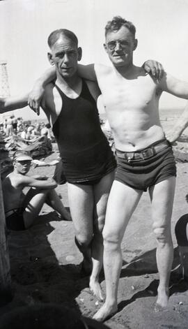 Man and William Headridge at a beach