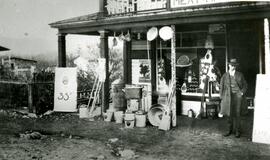 Pett's Store with fruit seller Harry Elphick standing in front