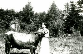 Maria Winter Van Leeuwen with a cow