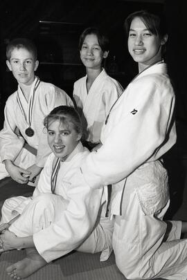 Mandy Hodge, Ian Munsie, Lenka Kudma, Brian Hodge with their judo medals