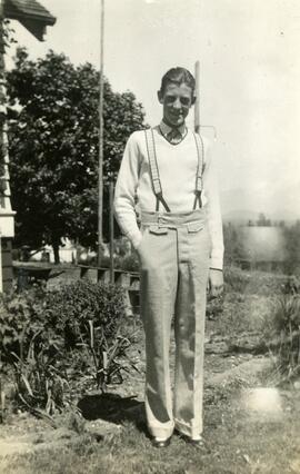Gordon Headridge standing in a yard