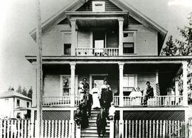 Boileau Family residence on Brunette Ave with the family on the front porch