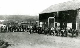Teamsters at Fraser Mills in front of the barn
