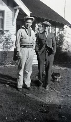 Andrew Manzer and William Headridge in front of likely Essondale Cottage 118
