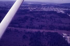 Aerial of Mundy Park over Como Lake Avenue