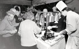 Lighthouse employee Andy Abenthung was kept busy slicing beef during Seniors Brunch
