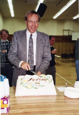 Blair Donnelly cutting Terra's 10th Anniversary cake