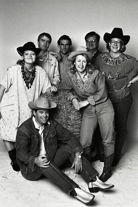 Ad people wearing cowboy outfits in the studio