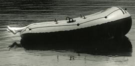 Person in a dingy on the water
