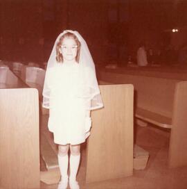 Doris Champagne at her first communion