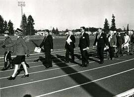 Mayor Lou Sekora and Council walk the track at Town Centre Stadium