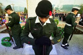 Remembrance Day at the Port Moody Legion, 2513 Clarke St. Dedication of new cenotaph. Color.