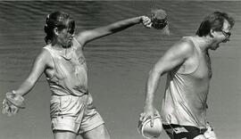 Tammy Bordingnon douses her Leigh Bordingnon with a bucket of water from Lafarge Lake at Towne Centre Rec Park (Tuesday)