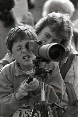 People armed with high-powered binoculars invade Burrard Inlet to look for birds, part of Port Moody Earth Day festivities